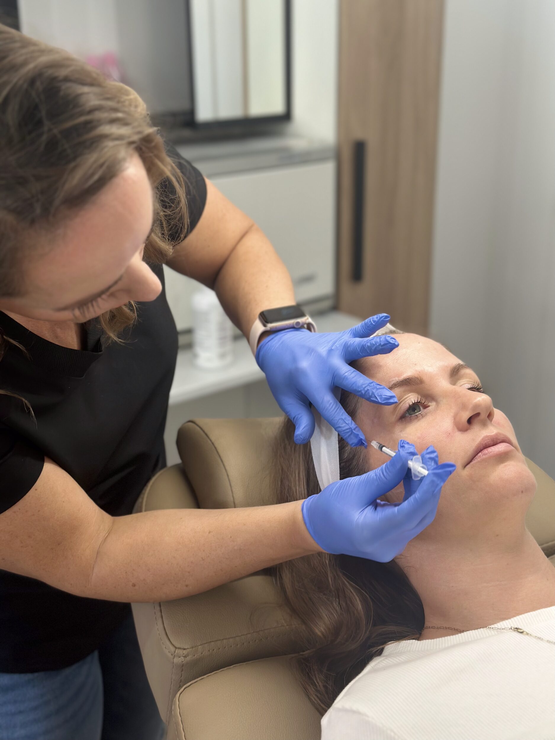 Nurse Katrina performing a professional Botox injection at Third Eye Beauty Lounge in Tempe, AZ to smooth fine lines and enhance natural beauty.
