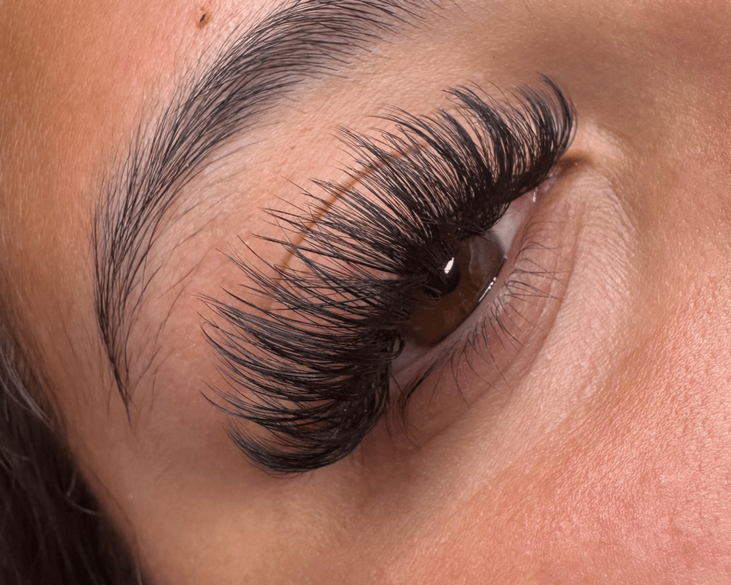 After photo of light volume lash extensions by Third Eye Beauty Lounge in Tempe, AZ — showcasing soft fullness, lifted curl, and a natural, fluffy finish