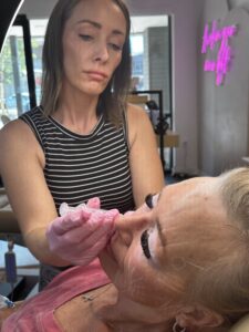 Client receiving Sculptra injections at Third Eye Beauty Lounge in Tempe, AZ, performed by a licensed injector Katrina to stimulate collagen and restore natural volume