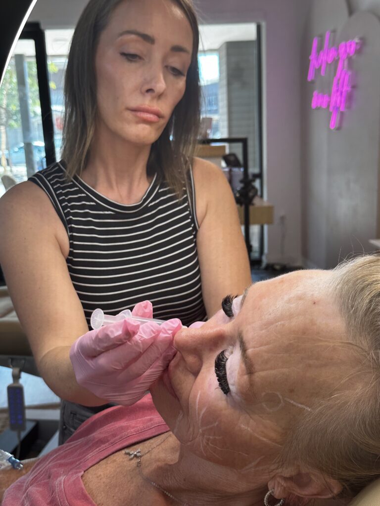 Client receiving Sculptra injections at Third Eye Beauty Lounge in Tempe, AZ, performed by a licensed injector Katrina to stimulate collagen and restore natural volume