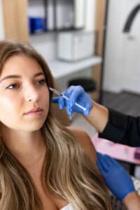 Cosmetic Nurse Injector Katrina with a client at Third Eye Beauty Lounge in Tempe, AZ