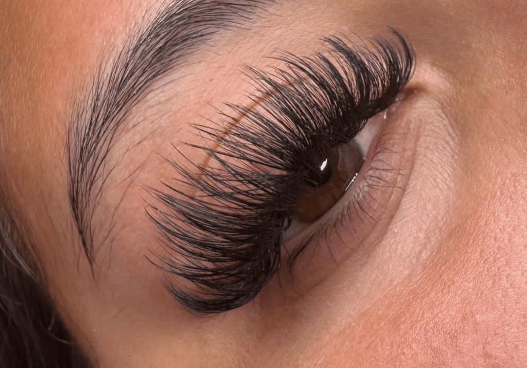 After photo of light volume lash extensions by Third Eye Beauty Lounge in Tempe, AZ — showcasing soft fullness, lifted curl, and a natural, fluffy finish